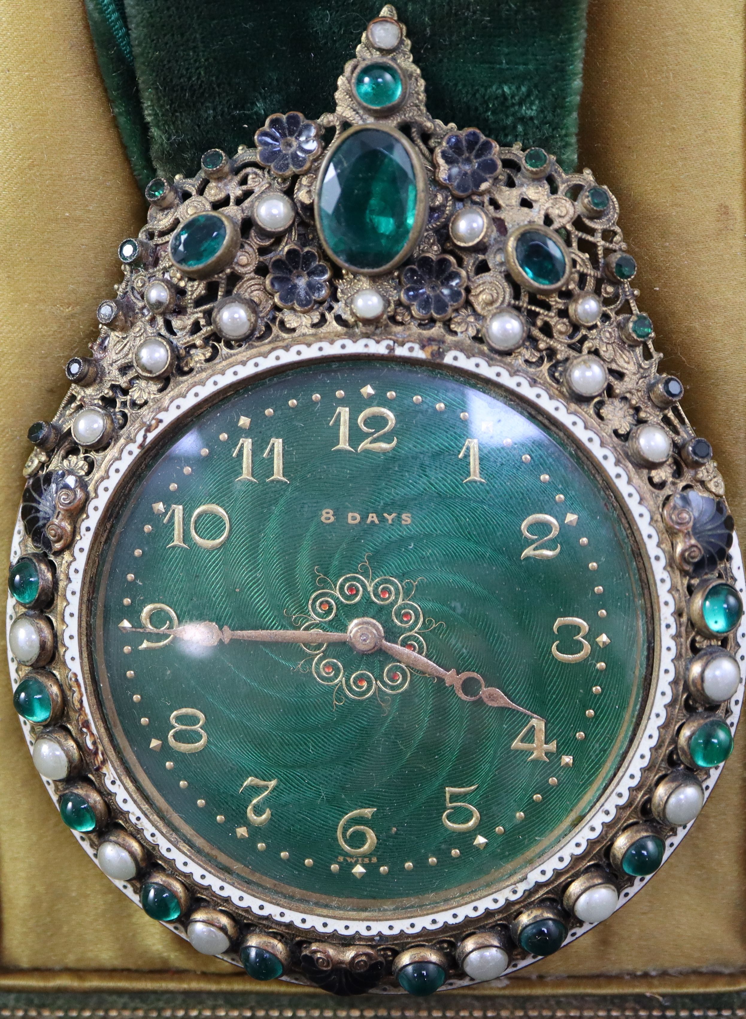 A 1930s Swiss be-jewelled brass eight day pendant timepiece, cased